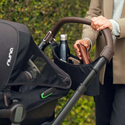 Nuna Mixx Next Stroller with stroller organiser containing a bottle, phone and wallet
